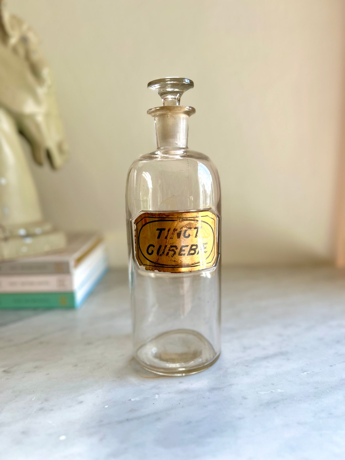 antique apothecary jar with stopper