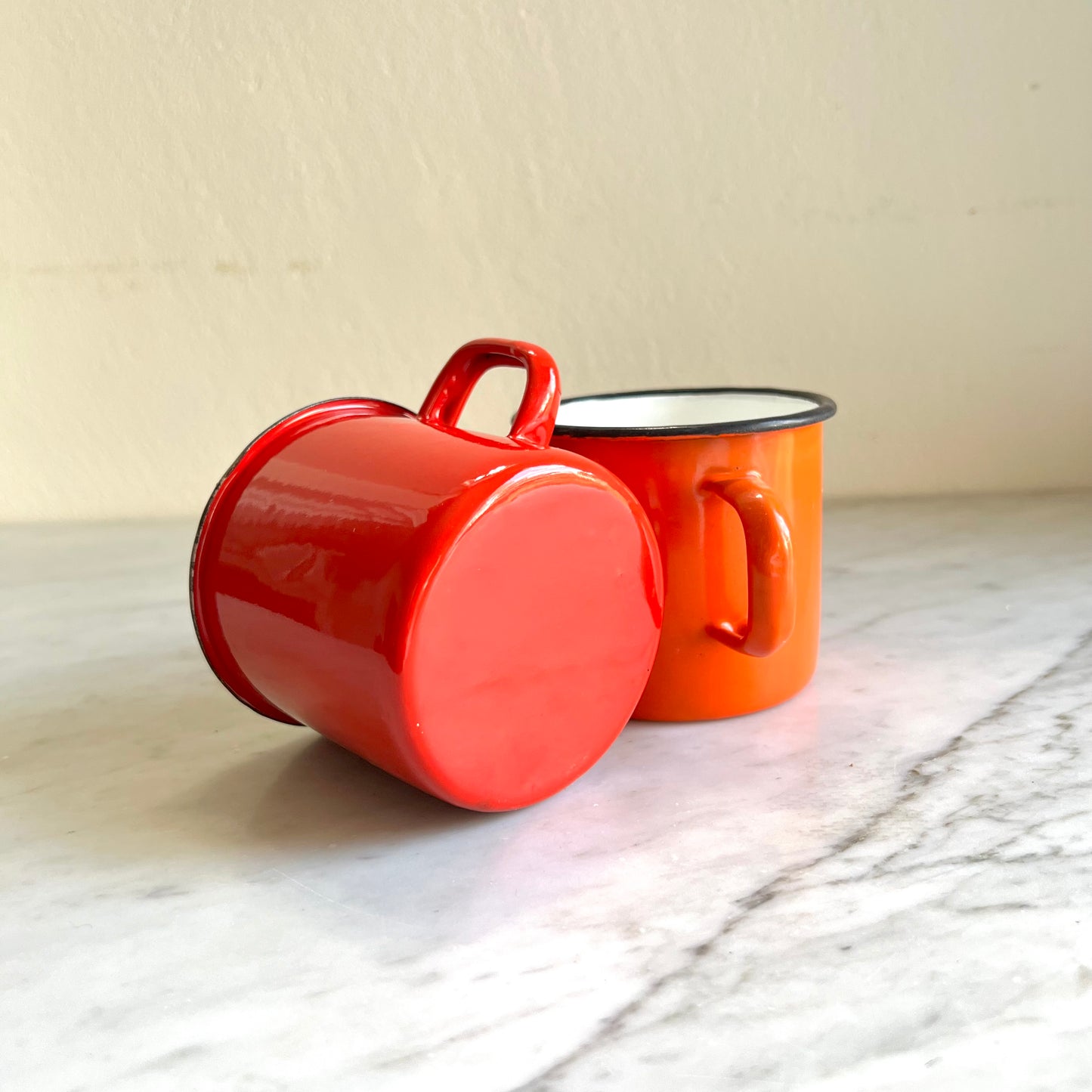 Pair of Red & Orange Enamel Coffee Mugs