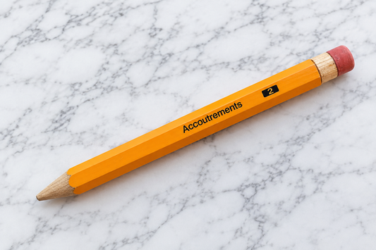 Oversized Accoutrements #2 wooden novelty pencil on marble background
