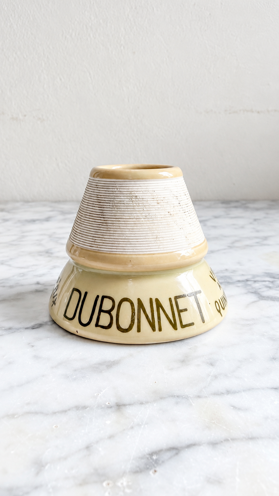 Vintage Dubonnet ceramic match holder detail