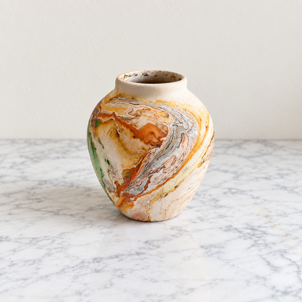 Edited front view of vintage Nemadji Pottery small marbled vase