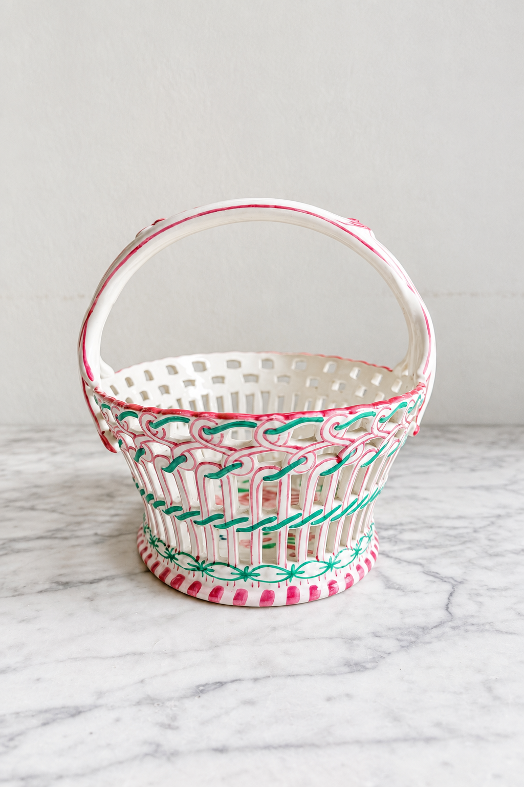 Vintage hand-painted reticulated ceramic basket with pink and green details